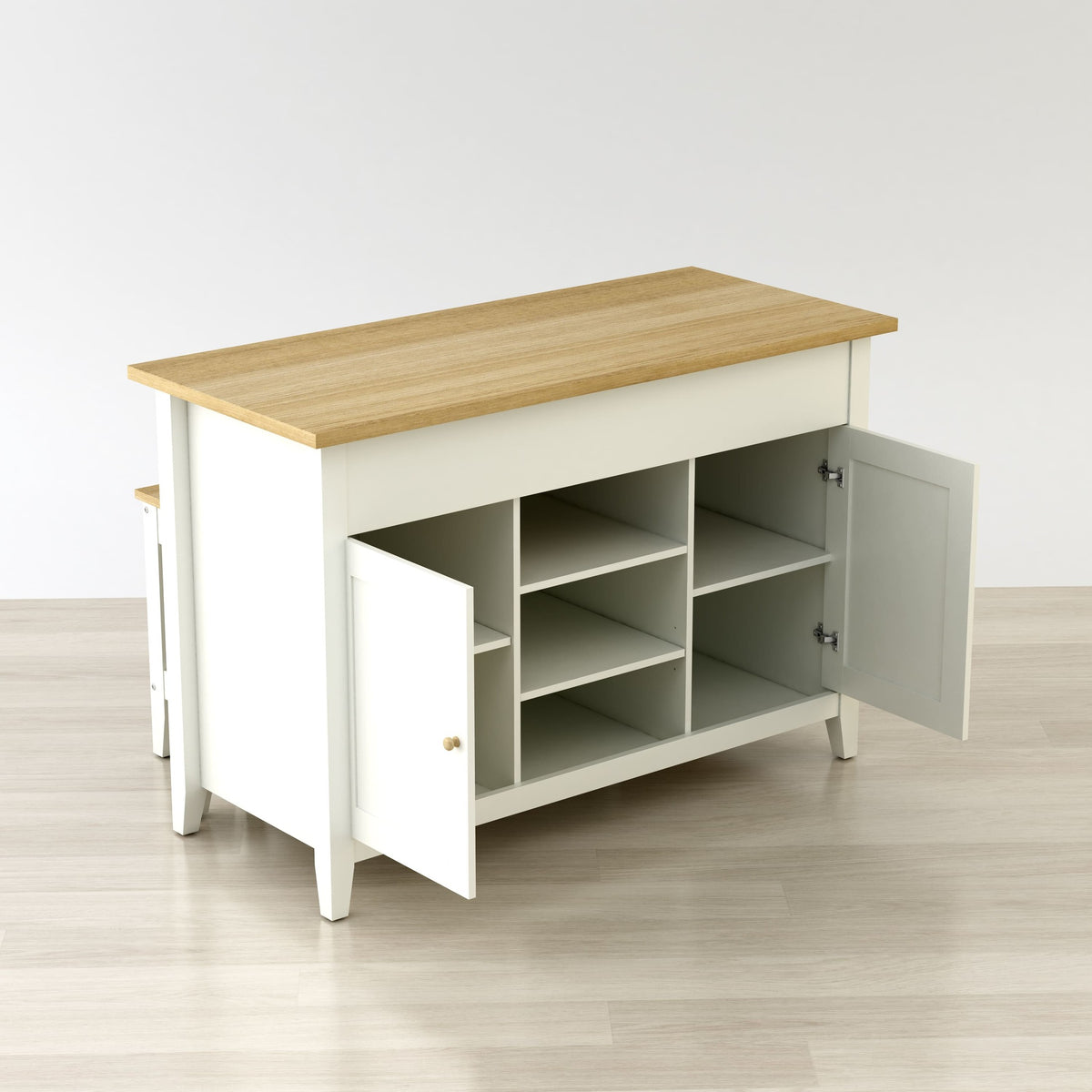 White cabinet with wooden top on a light wood floor