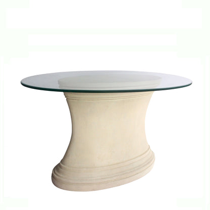 Round glass top table with a beige or light brown base on a white background
