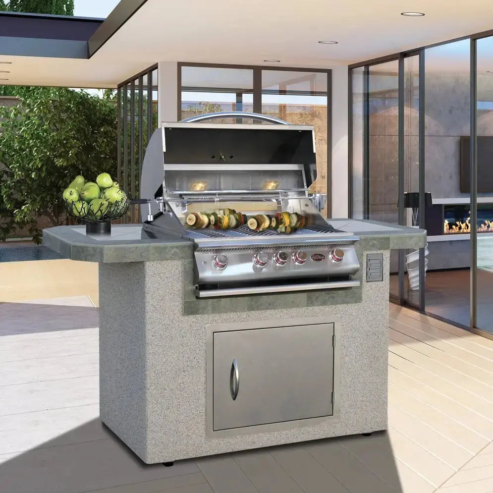 Custom outdoor kitchen with built-in grill on a poolside patio