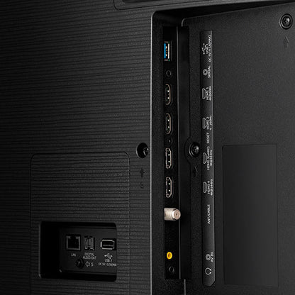 Back view of a black electronic device with ports and labels.
