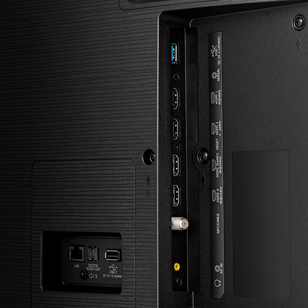 Back view of a black electronic device with ports and labels.