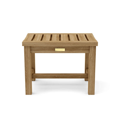 Wooden stool with a gold plaque on a white background