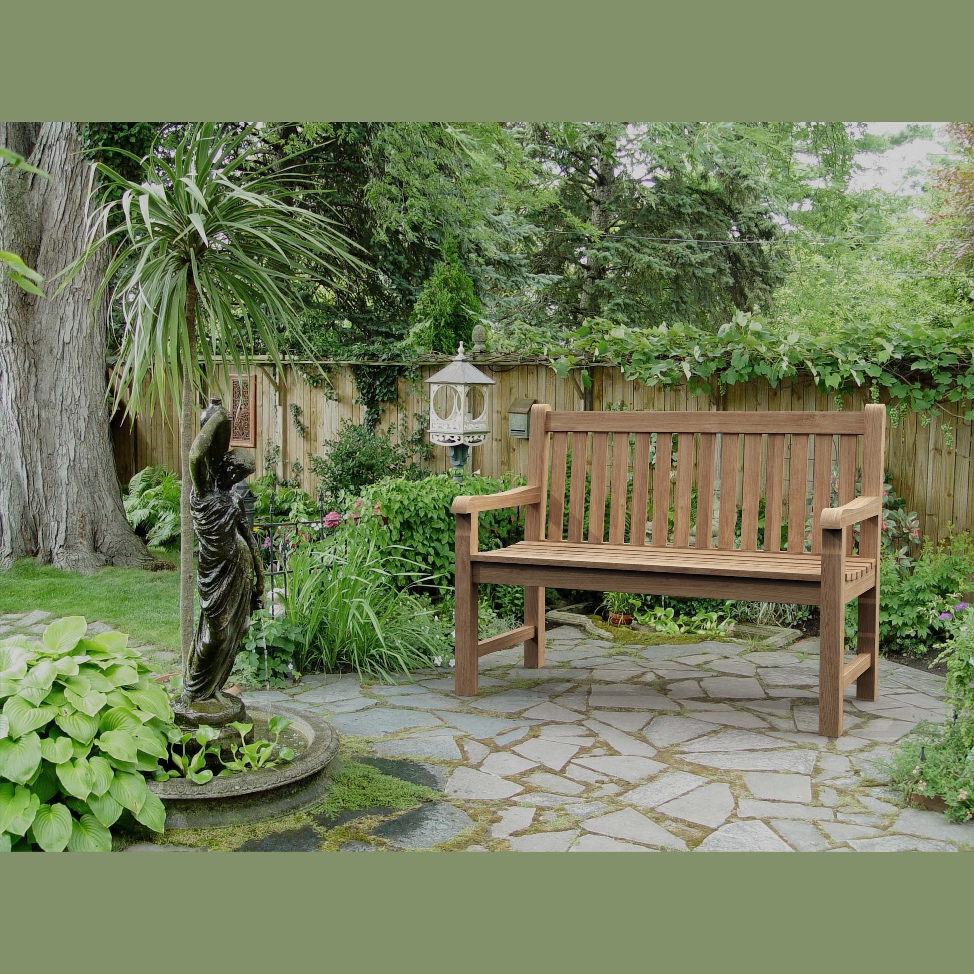 Wooden bench in a garden setting with a stone path and greenery.