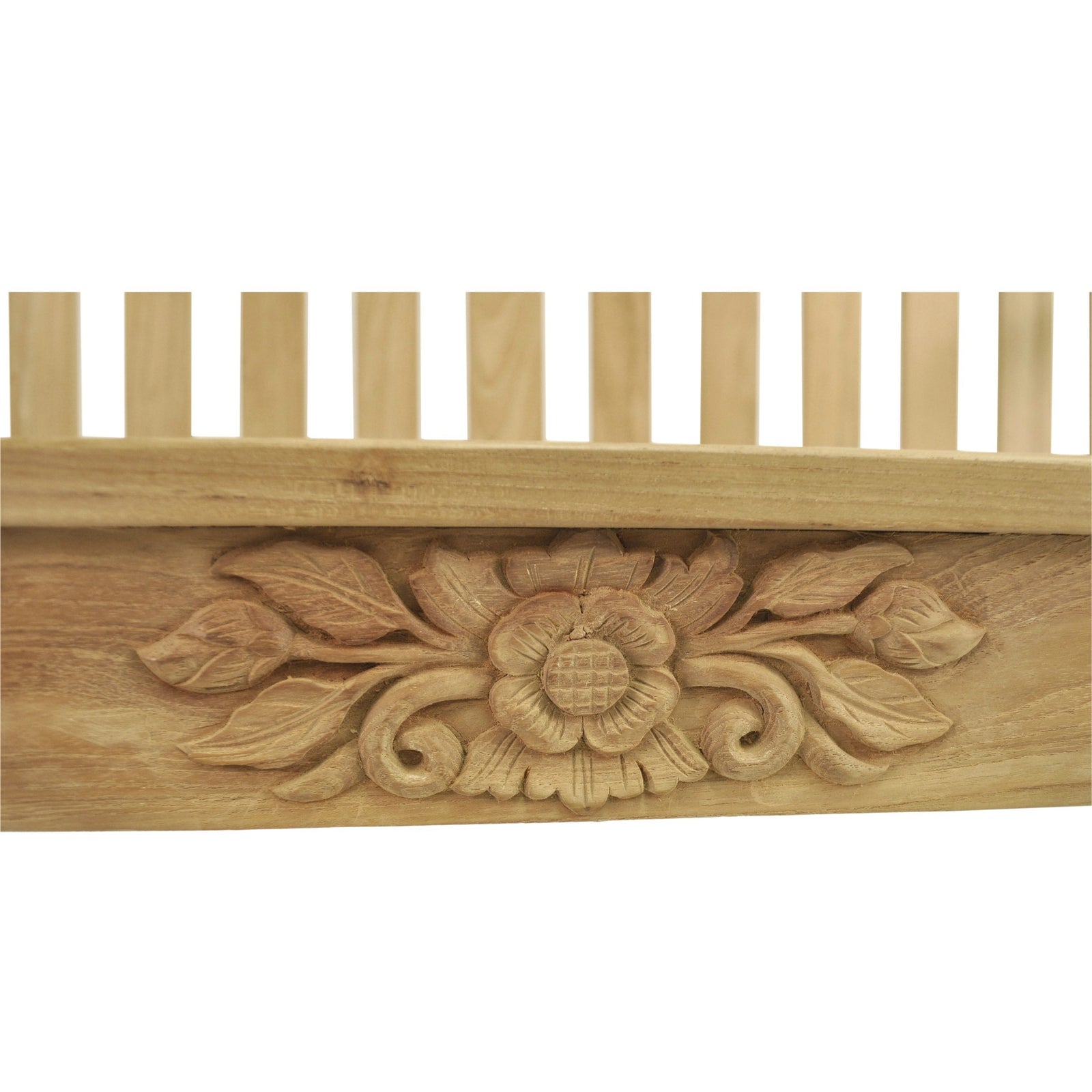 Wooden decorative molding with floral carvings on a white background
