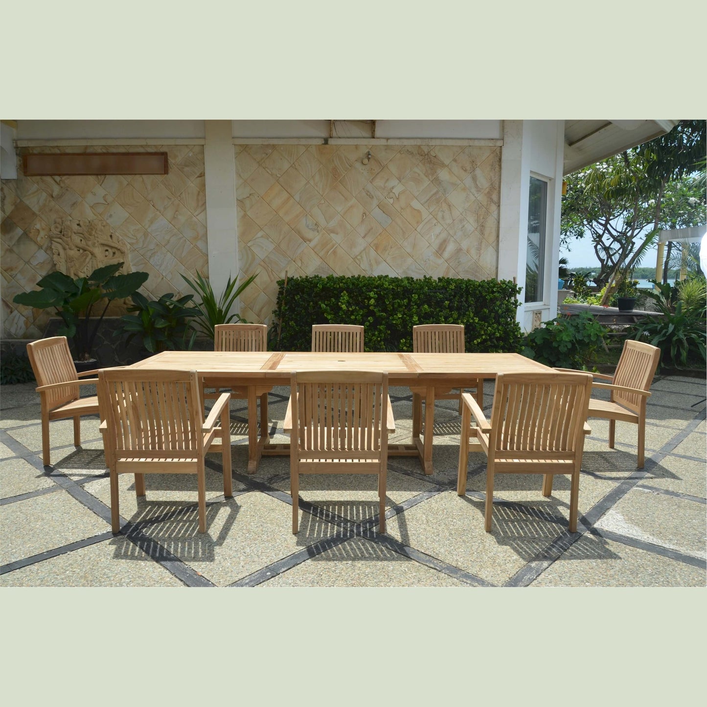 Outdoor wooden dining set with chairs on a patio