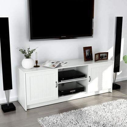 White TV stand with electronic devices, speakers, and decorative items in a room.