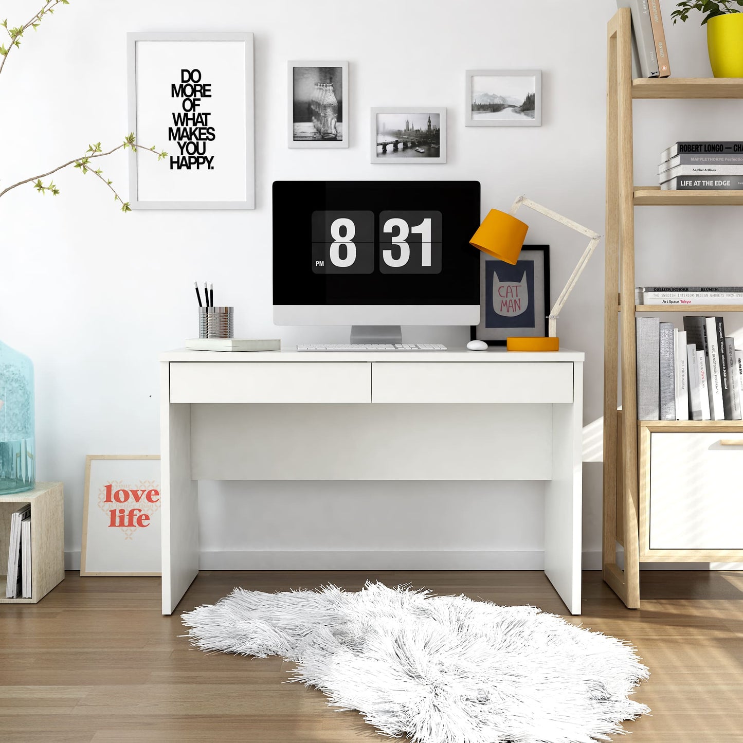 Modern home office with a white desk, computer monitor, and decorative elements.