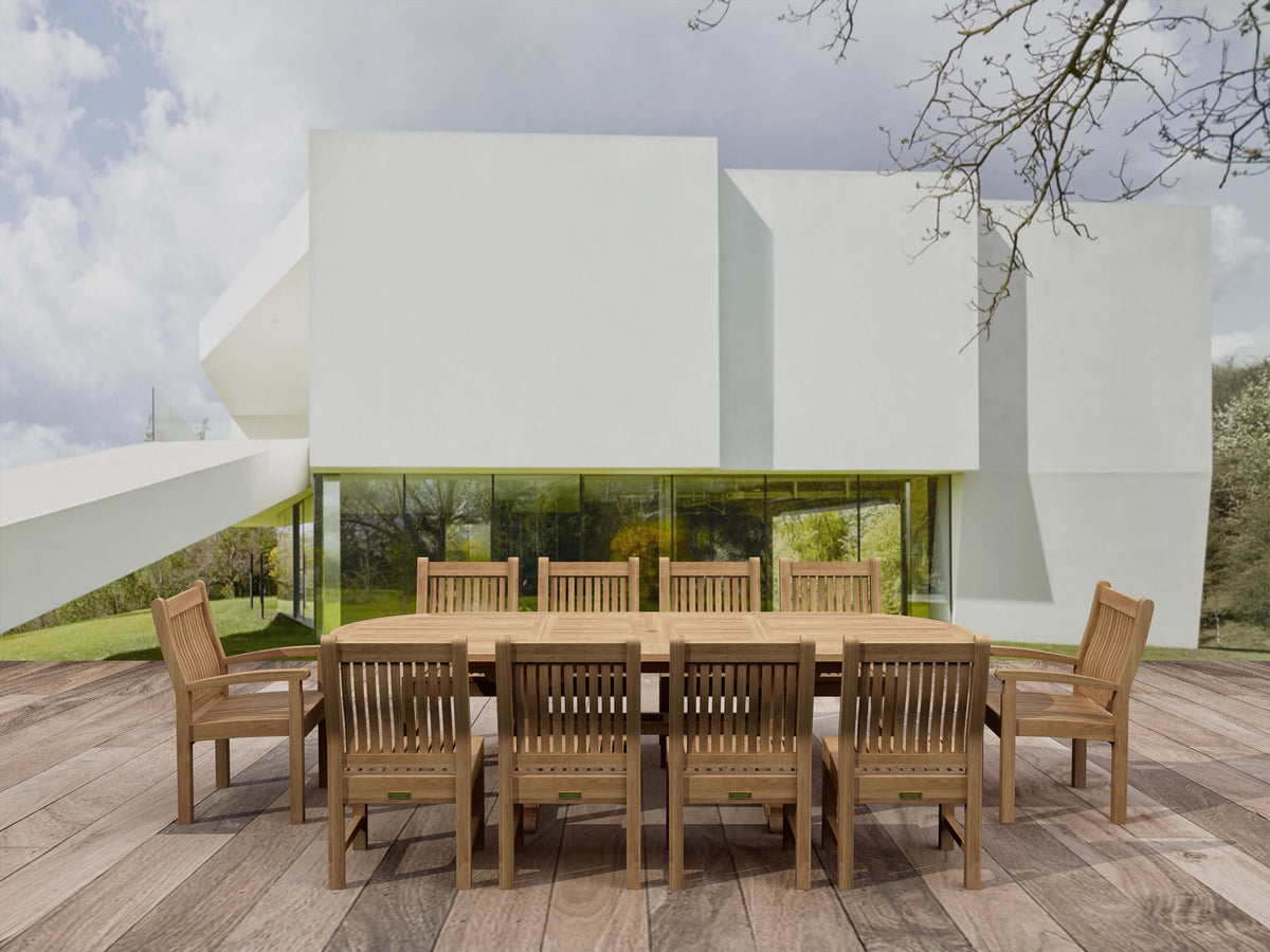 Wooden outdoor dining set on a deck with a modern building in the background