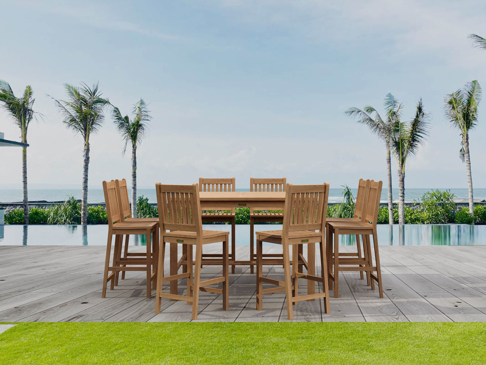 Outdoor dining set with wooden chairs and table on a patio with palm trees and pool in the background.