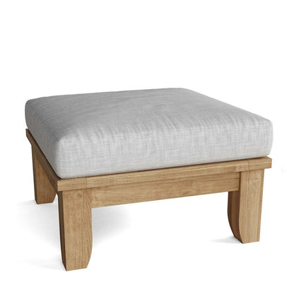 Wooden ottoman with a gray cushion on a white background