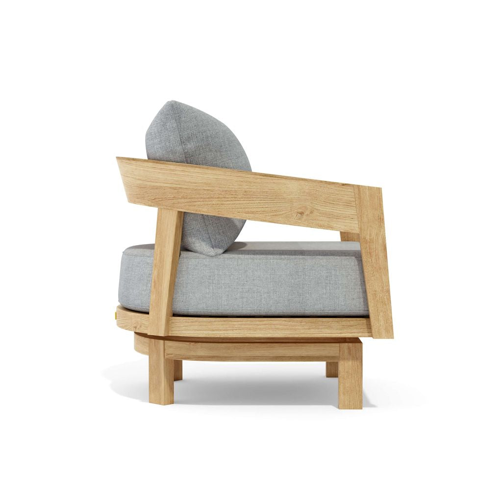 Wooden armchair with gray cushions on a white background