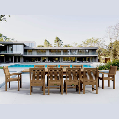 Wooden outdoor dining set with chairs near a modern house and pool.