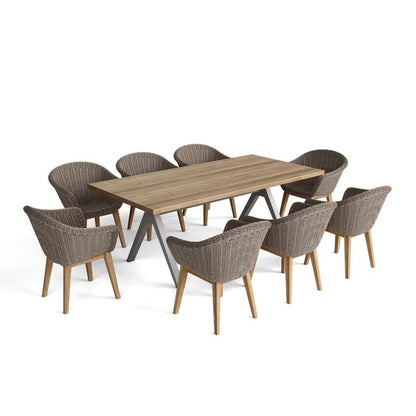 Wooden dining table with eight wicker chairs on a white background