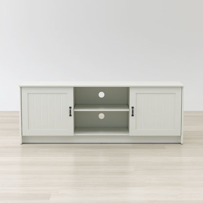 White entertainment console with open doors on a white background
