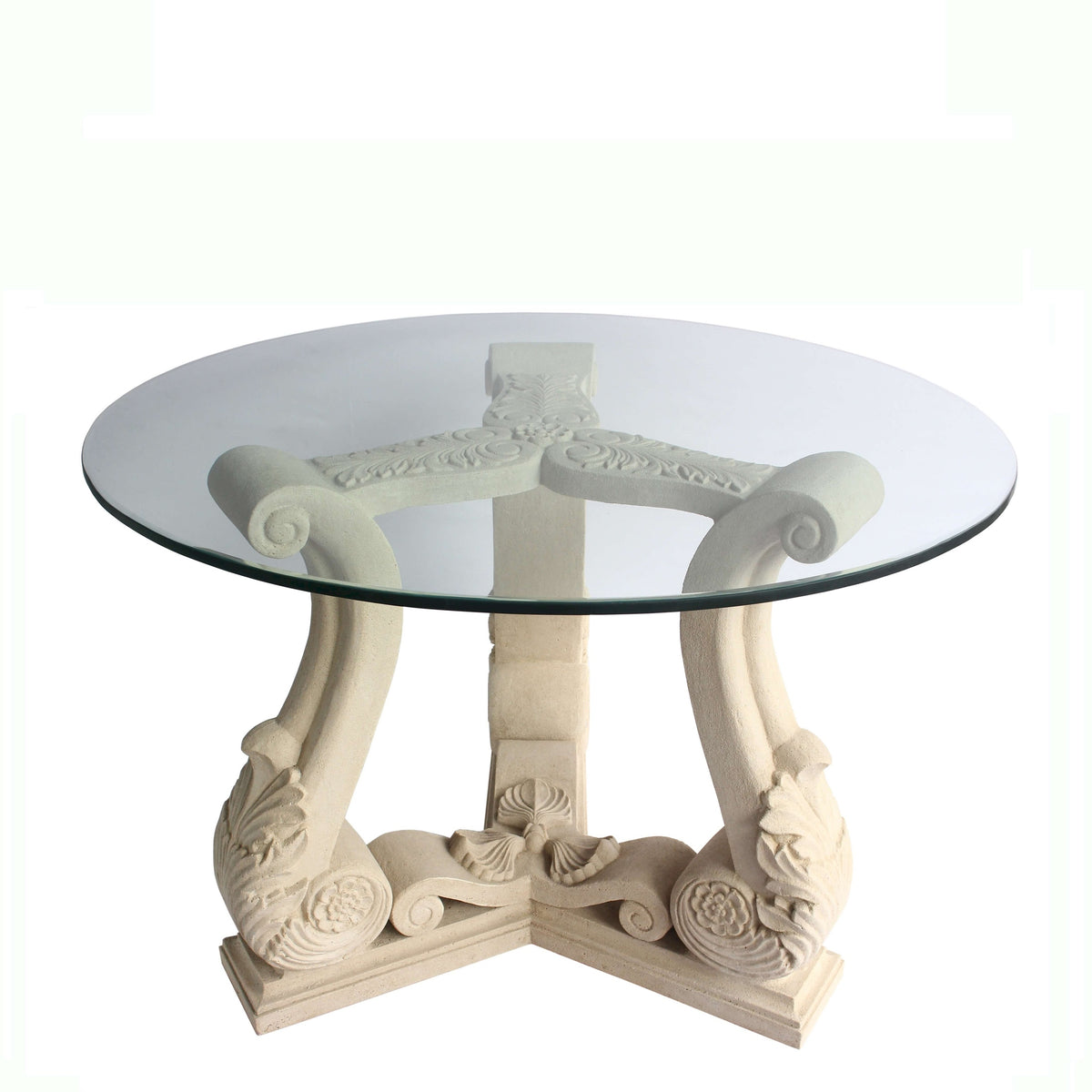 Decorative round table with glass top and ornate base on a white background