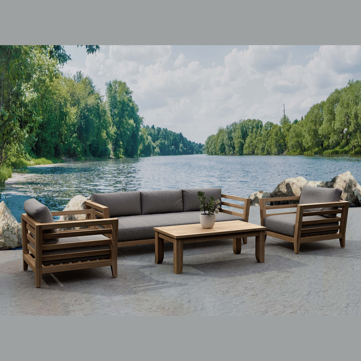 Outdoor furniture set with a sofa and chairs by a lake