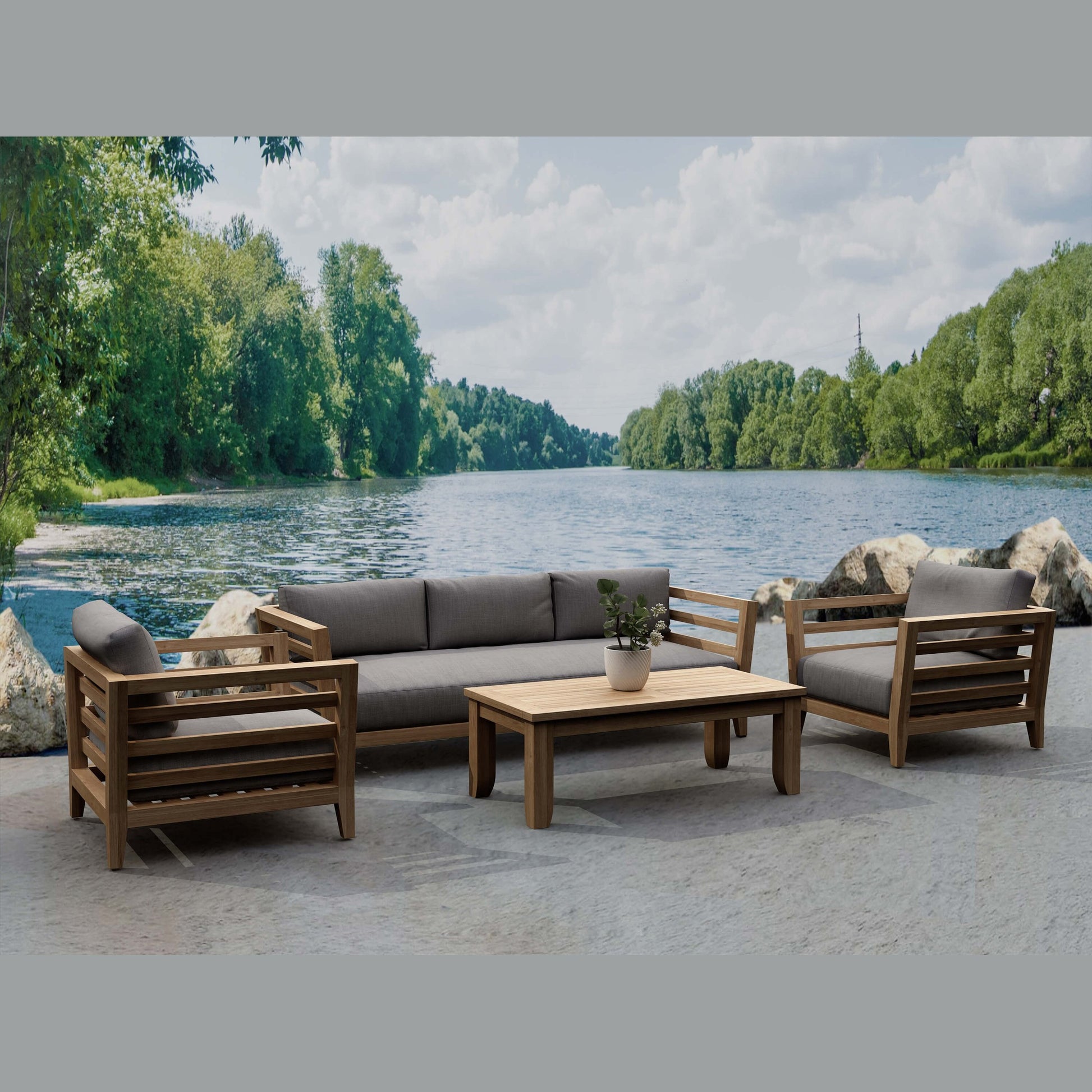 Outdoor furniture set with a sofa and chairs by a lake