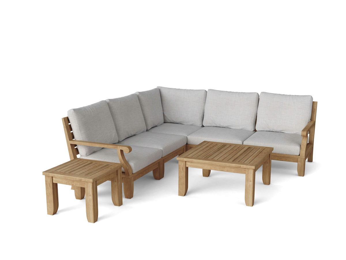 Outdoor furniture set with a sectional sofa, coffee table, and ottoman on a white background