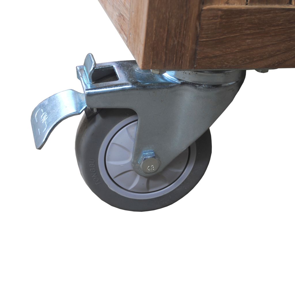 Caster wheel on a wooden surface with a white background