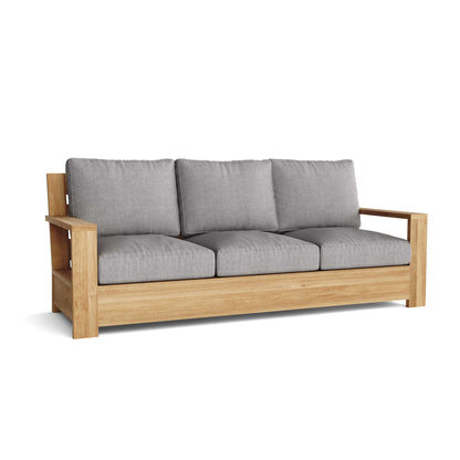 Wooden sofa with gray cushions on a white background