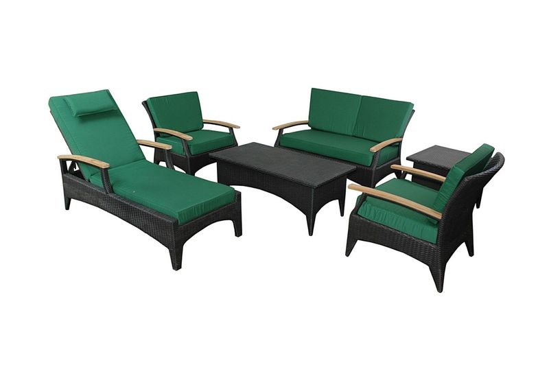 Outdoor furniture set with green cushions and black frames on a white background