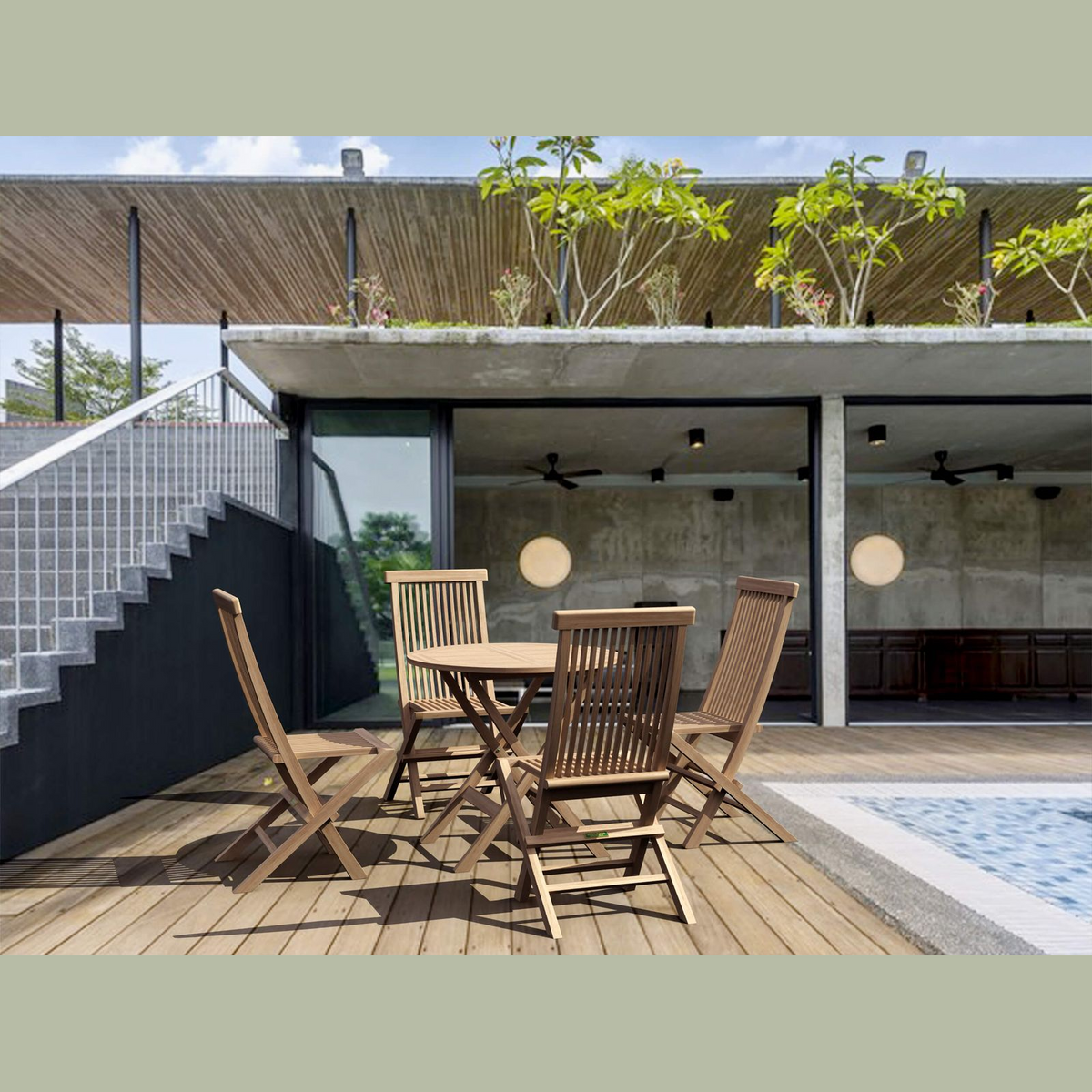 Outdoor patio with wooden furniture and a pool area.