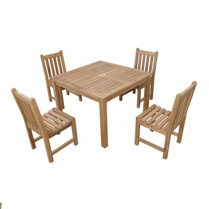 Wooden dining table with four matching chairs on a white background