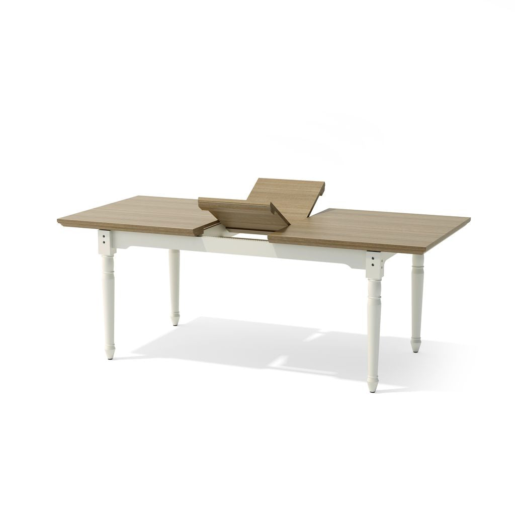 Wooden dining table with white base on a white background