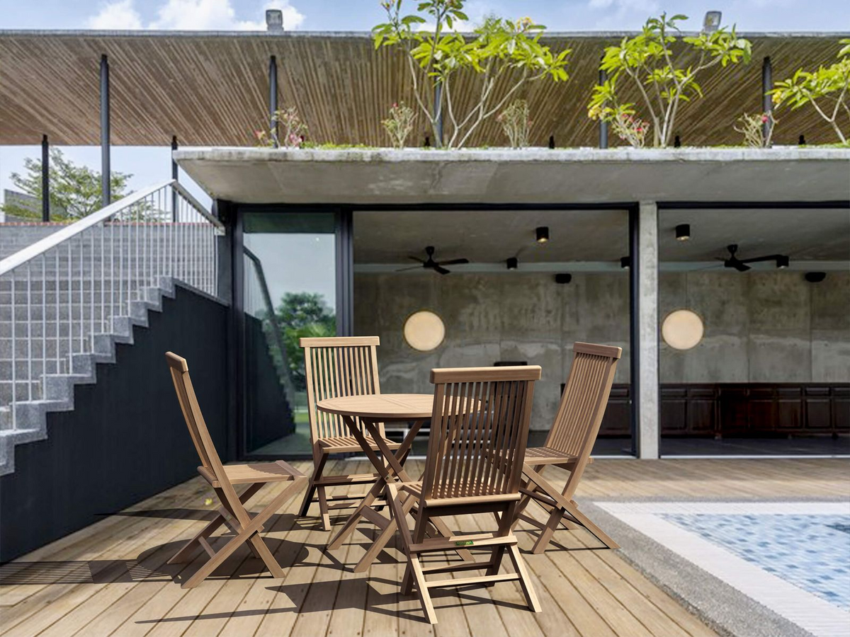 Outdoor patio with wooden furniture and a pool area.