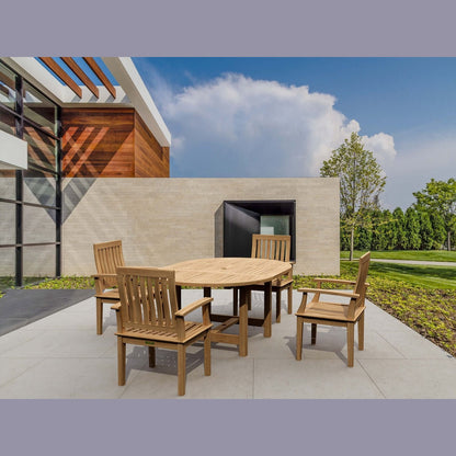 Wooden outdoor dining set on a patio with modern building and trees in the background