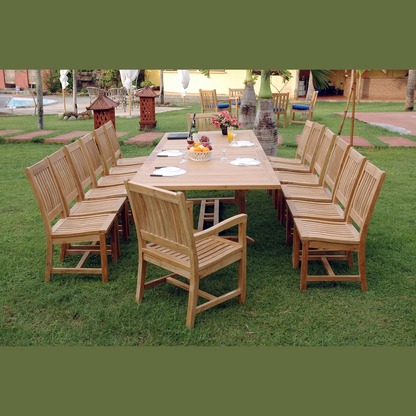 Wooden outdoor dining set with table and chairs on a grassy area