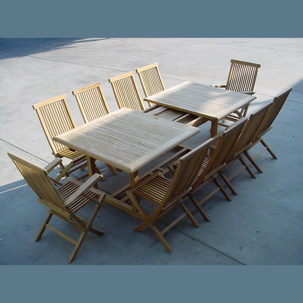 Outdoor teak furniture set with two tables and eight chairs on a concrete surface.