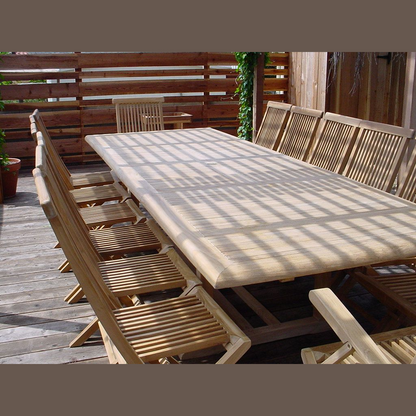 Wooden outdoor table with chairs on a wooden deck
