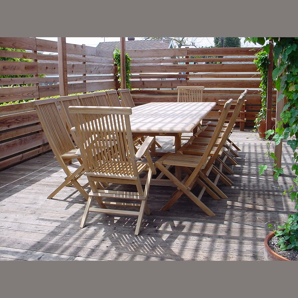 Wooden outdoor dining set with table and chairs on a wooden deck.