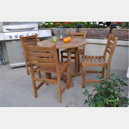 Wooden outdoor table with chairs on a patio