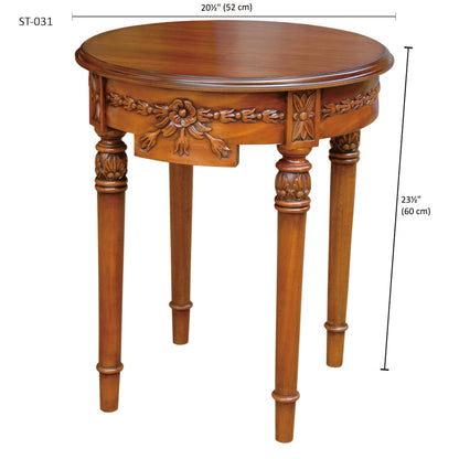 Wooden side table with intricate carvings and dimensions on a white background