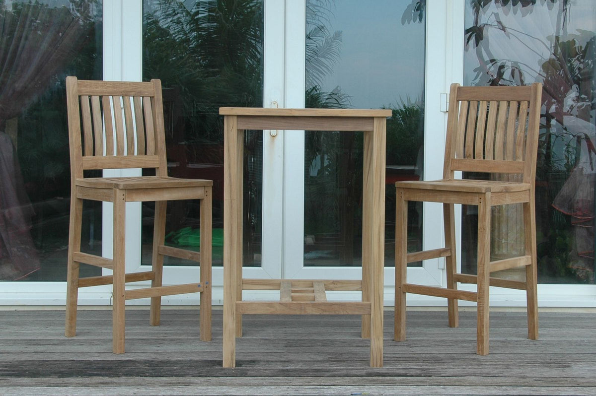 Wooden outdoor bar set with two stools and a table on a deck.