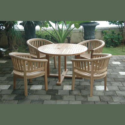Wooden outdoor dining set with round table and four chairs on a stone patio.