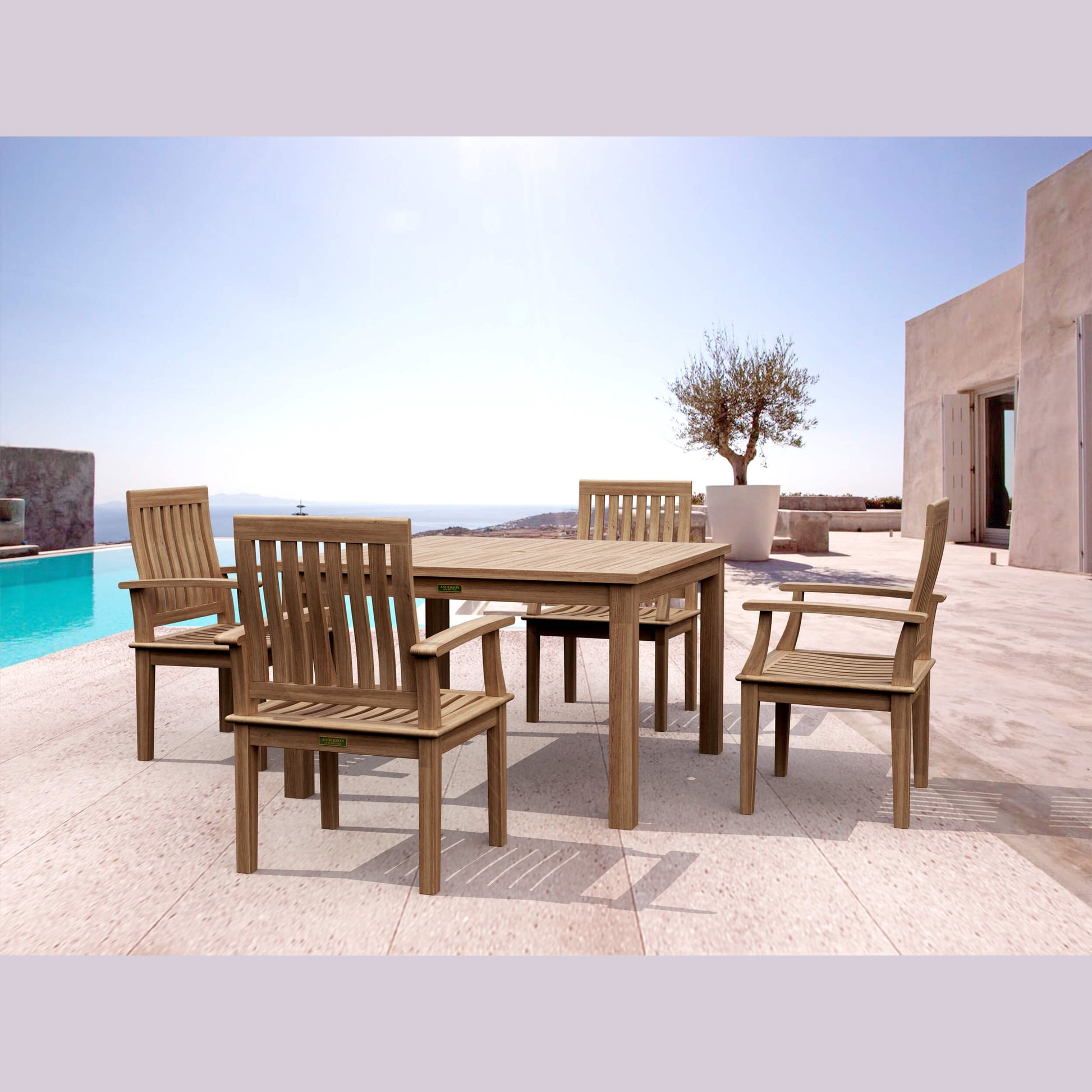 Wooden outdoor dining set with table and chairs on a patio with pool and ocean view.