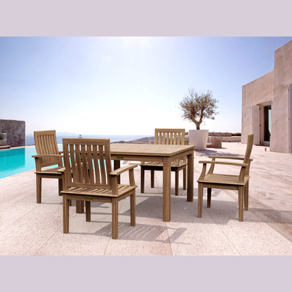 Wooden outdoor dining set with table and chairs on a patio with pool and ocean view.