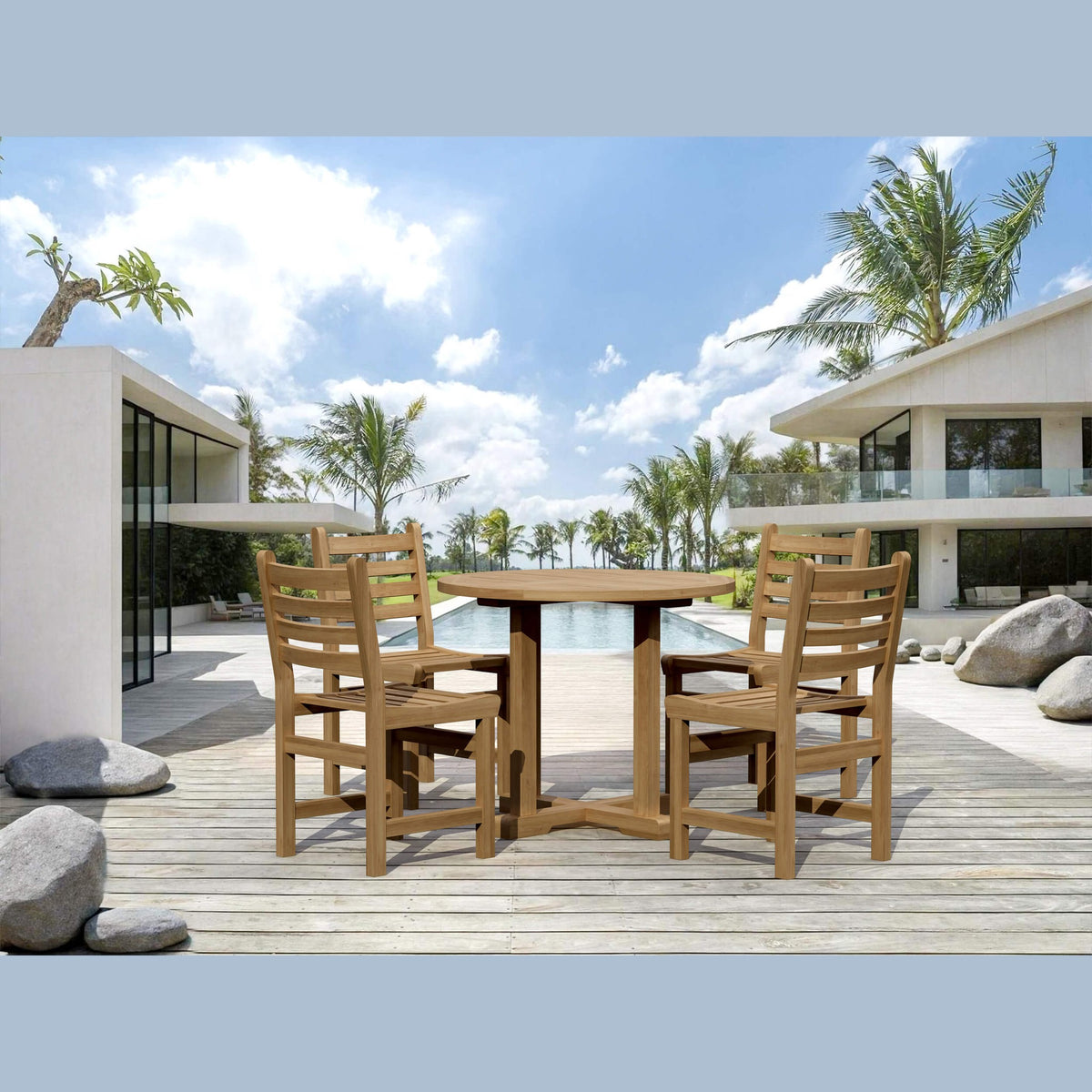 Wooden outdoor dining set on a deck with modern house and palm trees in the background
