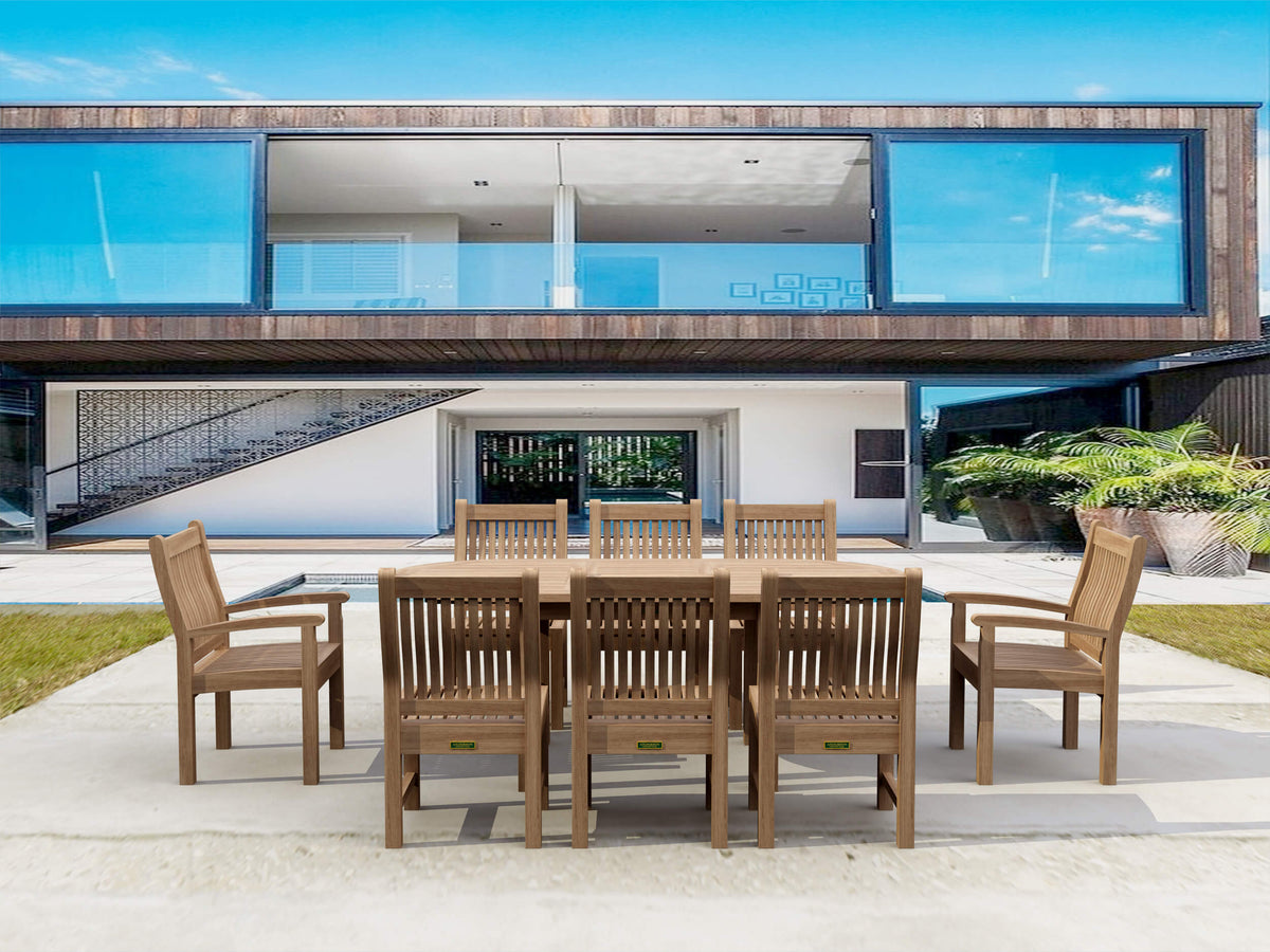 Wooden outdoor dining set in front of a modern house with large windows.