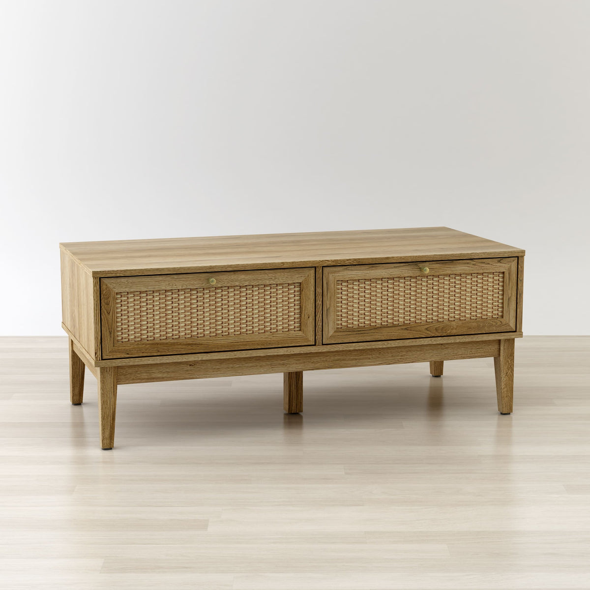 Wooden coffee table with wicker doors on a white background