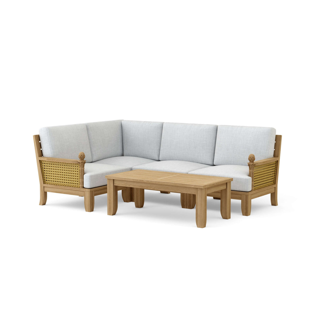 Sectional outdoor sofa with wicker frame and white cushions, accompanied by a matching coffee table on a white background.