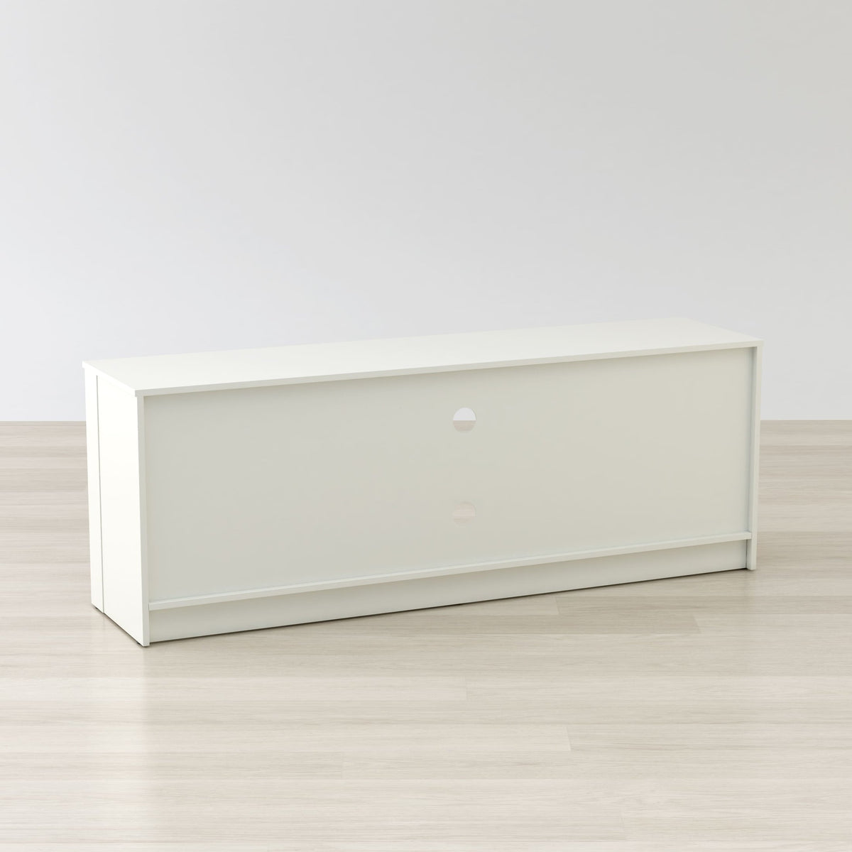 White office desk against a plain white wall