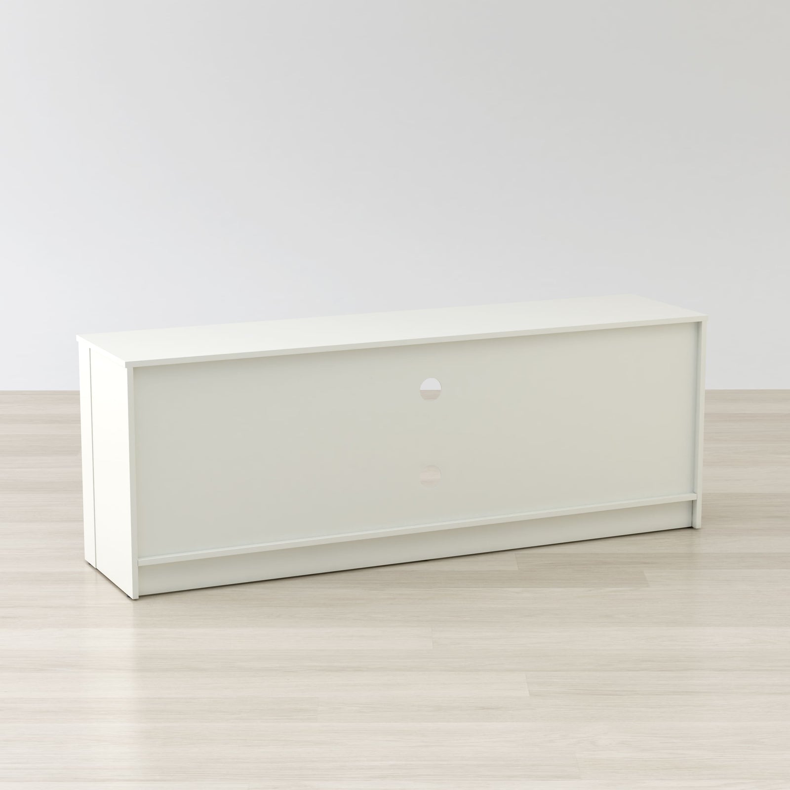 White office desk against a plain white wall