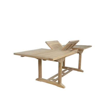 Wooden dining table with a leaf on a white background