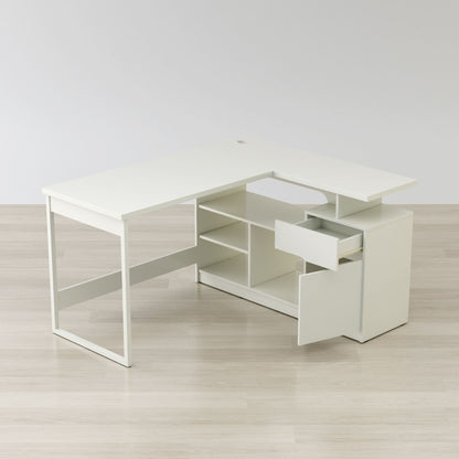 White L-shaped desk with a drawer on a light wooden floor.