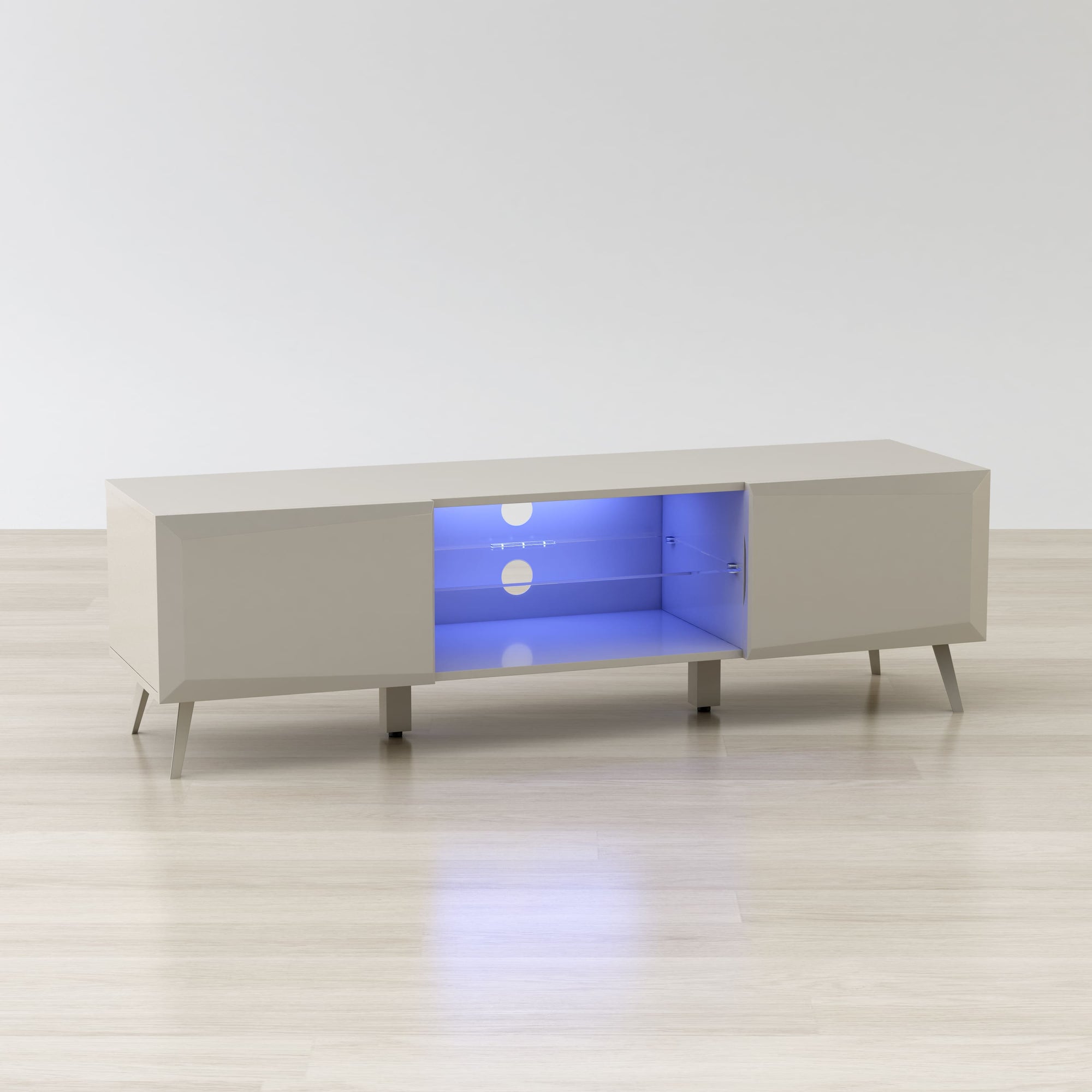White entertainment console with glowing blue interior on a white floor and background