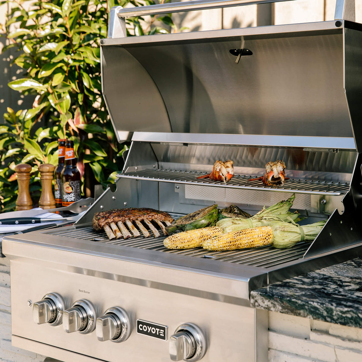 RTA Outdoor Living L-Shaped Outdoor Kitchen Island with Coyote 30 Inch S-Series Grill, Fridge and Bar Center - BetterPatio.com